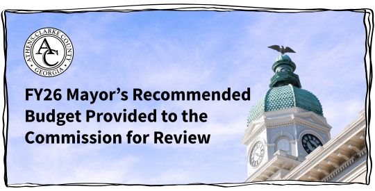 City Hall dome against a blue sky with clouds