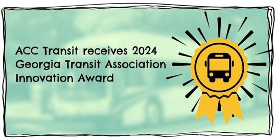 Award graphic on a blurred photo of an ACC Transit Hybrid Bus