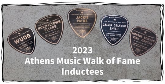 Five guitar pick-shaped plaques noting the 2023 Athens Walk of Fame inductees