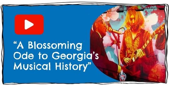 Mural showing Duane Allman playing a guitar and Ray Charles playing a piano