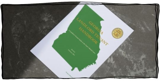 Copy of the Landlord Tenant Handbook laying on a concrete floor