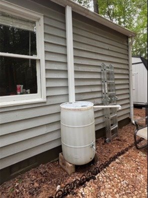 Rain Barrel under the Gutters