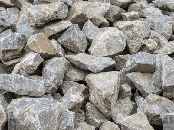 A pile of grey type-3 riprap rock