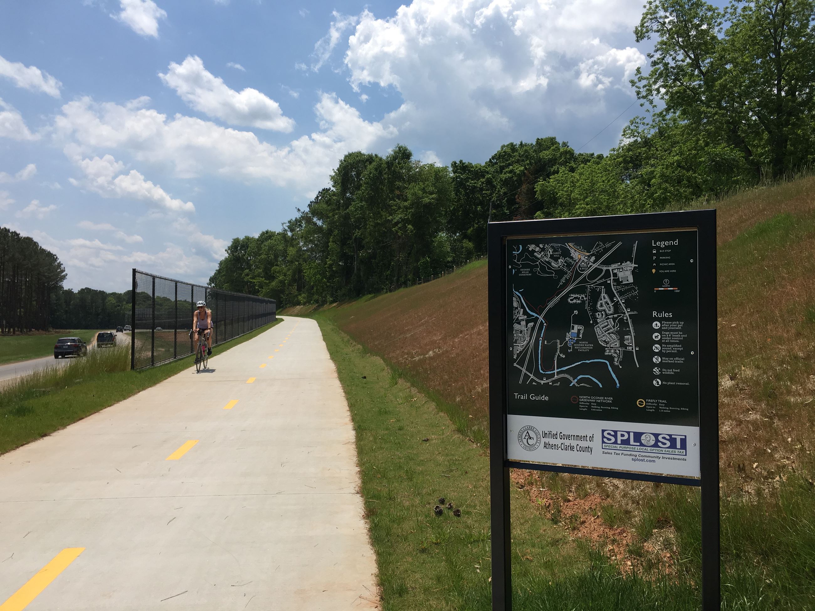 Multi purpose paved trail through forest