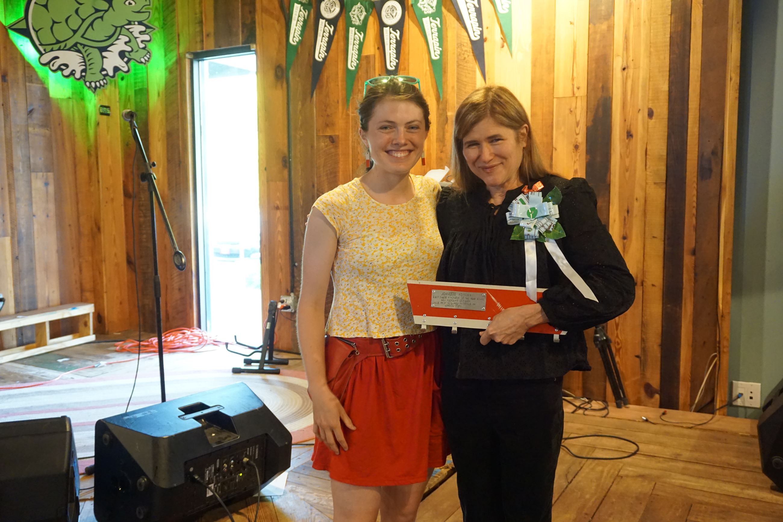 Jeanette Morgan receives the 2022 Individual Waste Reduction Award from Abigail West