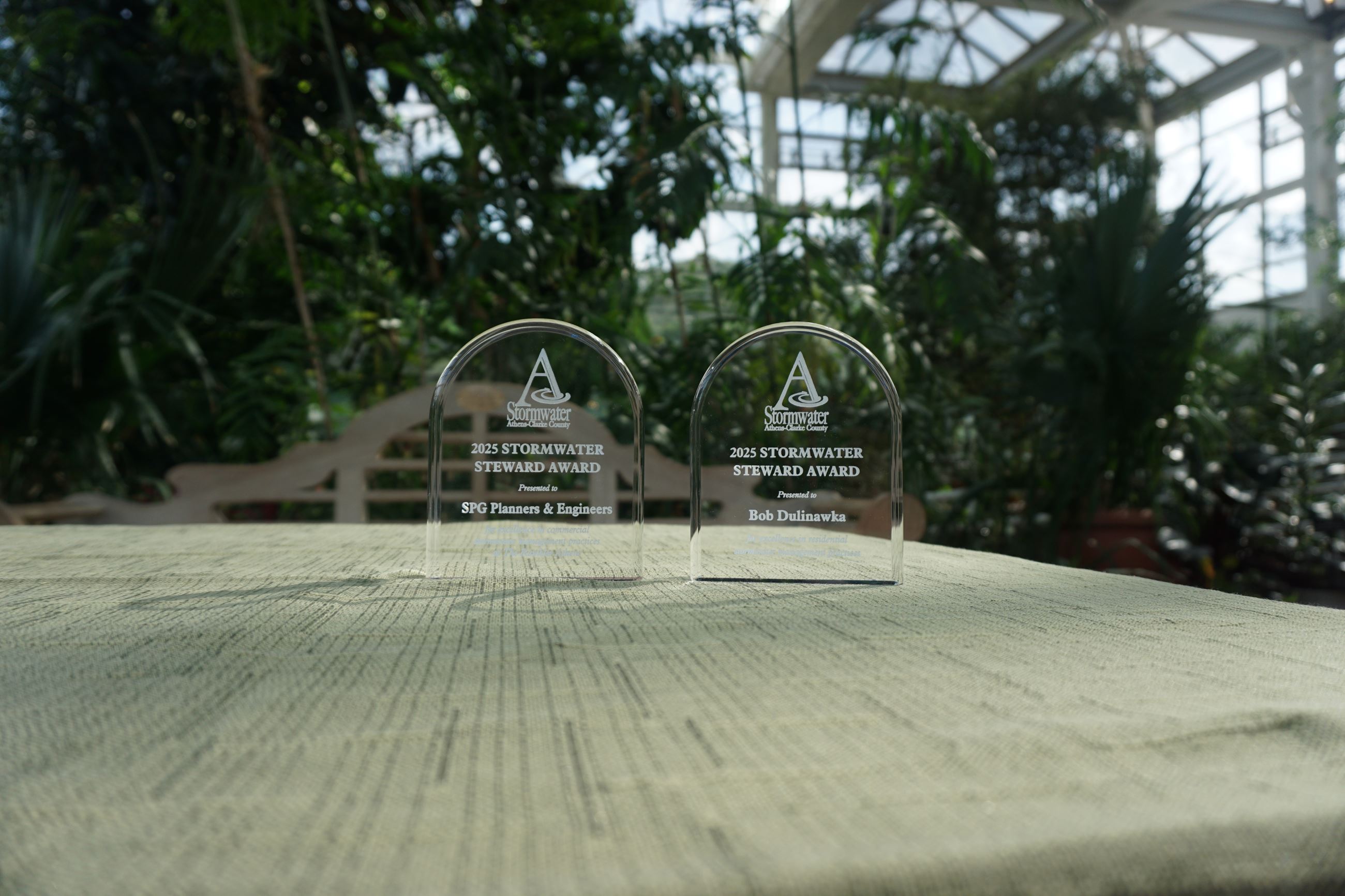 A photo of 2 acrylic awards