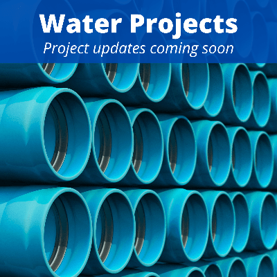 Image of water pipes that links to updates on water projects